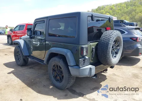 2015 Jeep Wrangler Willys Wheeler z USA, uszkodzony, nr VIN 1C4AJWAG1FL714131